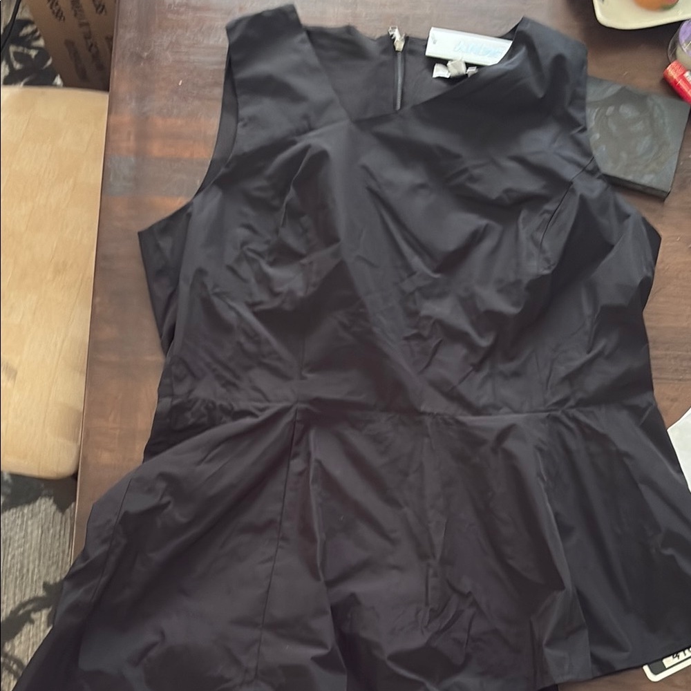 DKNY asymmetrical peplum top size M